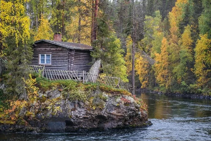 Framed Print : Beautiful fall colors with cabin and river at autumn day in Myllykoski, Kuusamo, Finland Framed Print : Beautiful fall colors with cabin and river at autumn day in Myllykoski, Kuusamo, Finland