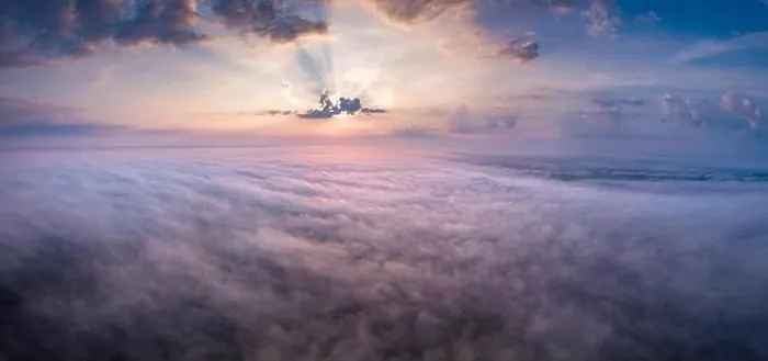 Framed Print : Beautiful foggy sunrise panoramic landscape from drone. Magical sunrise over the clouds Framed Print : Beautiful foggy sunrise panoramic landscape from drone. Magical sunrise over the clouds