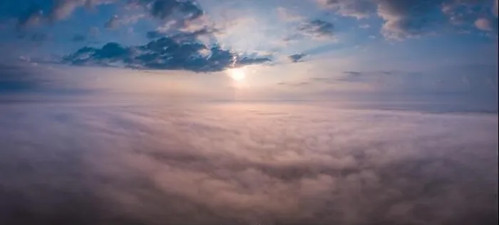 Framed Print : Beautiful foggy sunrise panoramic landscape from drone. Magical sunrise over the clouds