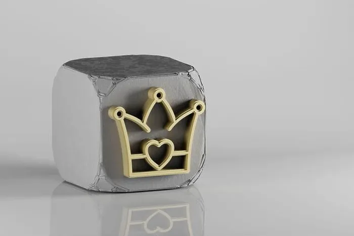 Framed Print : Beautiful Golden crown with heart symbol on a beton cube and white ceramic background