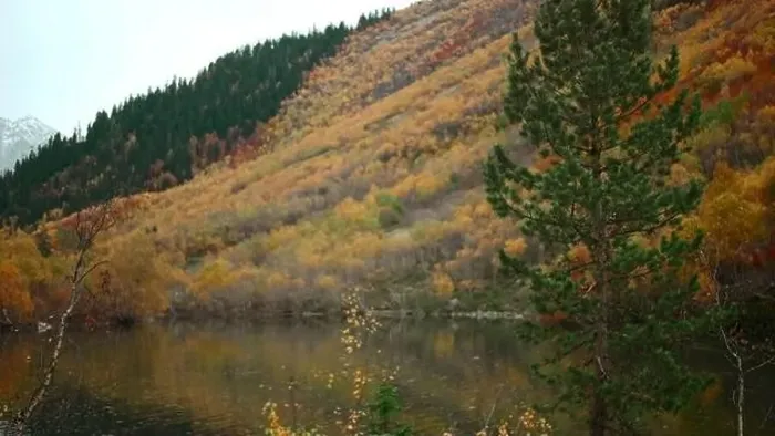 Framed Print : Beautiful lake with colorful autumn mountain slopes Framed Print : Beautiful lake with colorful autumn mountain slopes