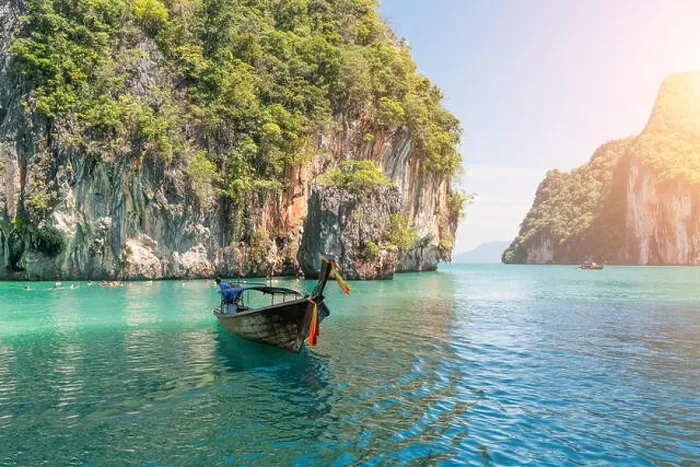 Framed Print : Beautiful landscape of rocks mountain and crystal clear sea with longtail boat at Phuket, Thailand. Summer, Travel, Vacation, Holiday concept Framed Print : Beautiful landscape of rocks mountain and crystal clear sea with longtail boat at Phuket, Thailand. Summer, Travel, Vacation, Holiday concept