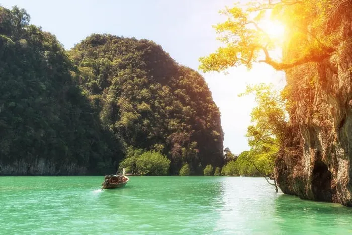 Framed Print : Beautiful landscape of rocks mountain and crystal clear sea with longtail boat at Phuket, Thailand. Summer, Travel, Vacation, Holiday concept Framed Print : Beautiful landscape of rocks mountain and crystal clear sea with longtail boat at Phuket, Thailand. Summer, Travel, Vacation, Holiday concept