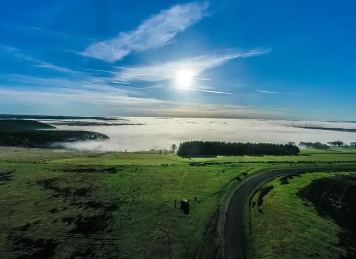 Framed Print : Beautiful morning of drone footage overlooking welsh sceneray with fog sheet covering the lower valleys in south wales Framed Print : Beautiful morning of drone footage overlooking welsh sceneray with fog sheet covering the lower valleys in south wales