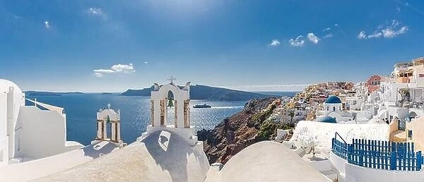 Beautiful Oia town on Santorini island, Greece. Traditional white architecture amazing panoramic landscape. Perfect summer vacation travel destination