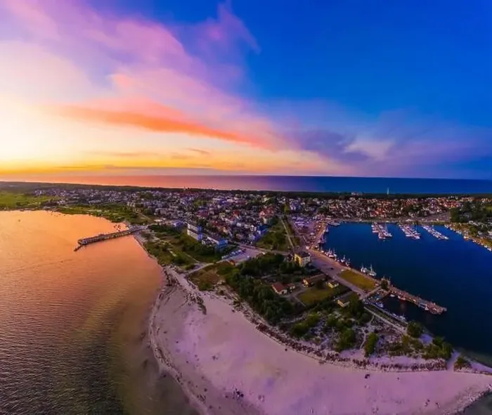 Framed Print : Beautiful Panorama color sky, sunset by the Baltic Sea, Jastarnia, Poland. Harbor. Aerial View Framed Print : Beautiful Panorama color sky, sunset by the Baltic Sea, Jastarnia, Poland. Harbor. Aerial View