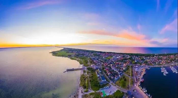 Framed Print : Beautiful Panorama color sky, sunset by the Baltic Sea, Jastarnia, Poland. Harbor. Aerial View Framed Print : Beautiful Panorama color sky, sunset by the Baltic Sea, Jastarnia, Poland. Harbor. Aerial View