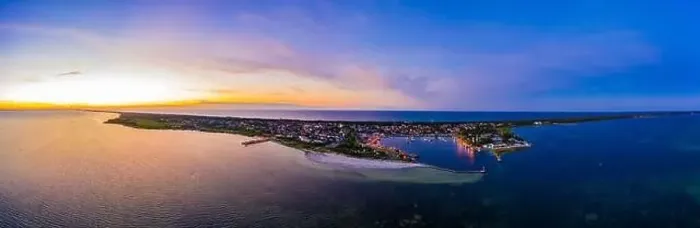 Framed Print : Beautiful Panorama color sky, sunset by the Baltic Sea, Jastarnia, Poland. Harbor. Aerial View Framed Print : Beautiful Panorama color sky, sunset by the Baltic Sea, Jastarnia, Poland. Harbor. Aerial View