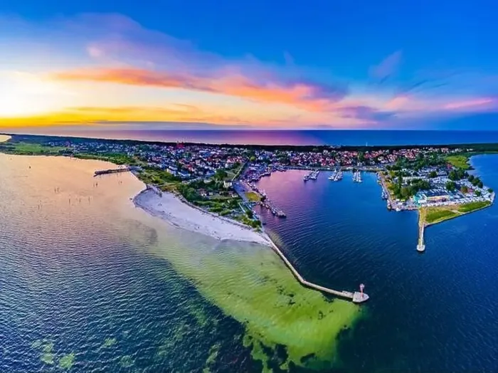Framed Print : Beautiful Panorama color sky, sunset by the Baltic Sea, Jastarnia, Poland. Harbor. Aerial View Framed Print : Beautiful Panorama color sky, sunset by the Baltic Sea, Jastarnia, Poland. Harbor. Aerial View