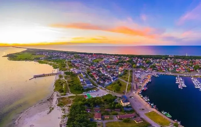 Framed Print : Beautiful Panorama color sky, sunset by the Baltic Sea, Jastarnia, Poland. Harbor. Aerial View Framed Print : Beautiful Panorama color sky, sunset by the Baltic Sea, Jastarnia, Poland. Harbor. Aerial View