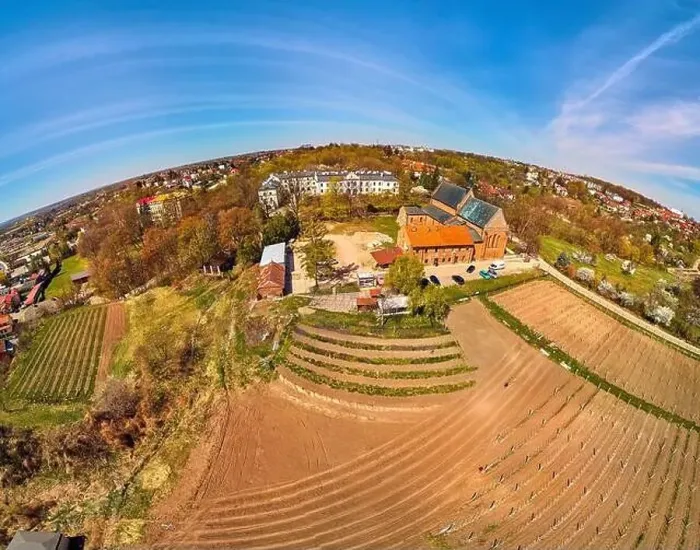Framed Print : Beautiful panoramic aerial drone view to the Sandomierz Royal Castle - planting vines in the vineyard of St Framed Print : Beautiful panoramic aerial drone view to the Sandomierz Royal Castle - planting vines in the vineyard of St