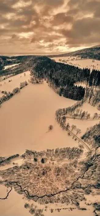 Framed Print : Beautiful panoramic aerial drone view on a winter landscape in the Stolowe mountains during a snowfall