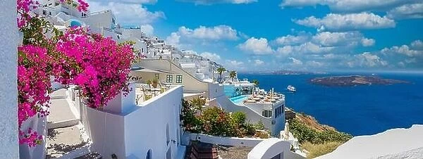 Beautiful panoramic travel view on the mediterranean blue sea, caldera and volcano. Traditional white architecture of Santorini island, Thira, Greece