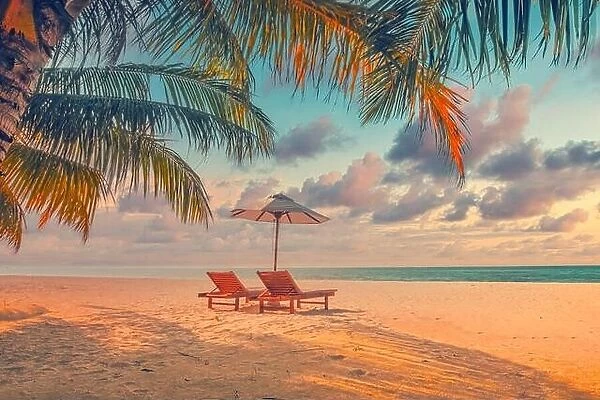 Beautiful panoramic tropical beach. Sunset summer island landscape with love couple chairs umbrella palm leaves calm sea shore, coast. Romantic travel