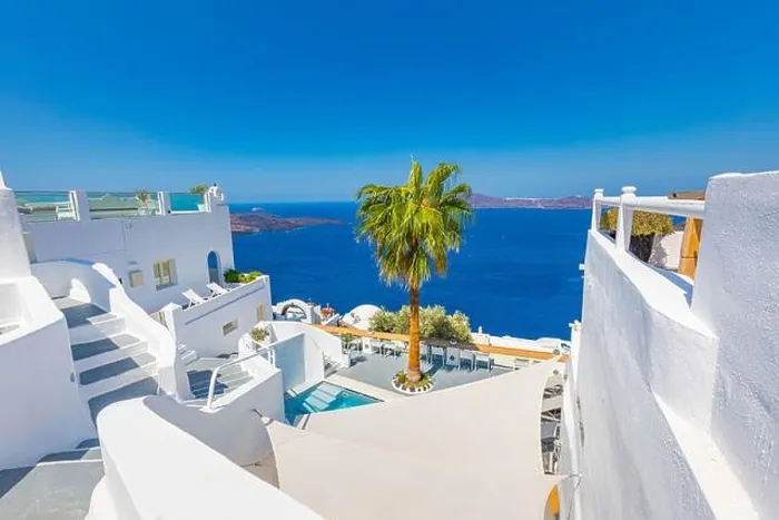 Framed Print : Beautiful Santorini terrace landscape, white architecture with sunny caldera view. Famous tourist hotel resort, travel vacation destination Framed Print : Beautiful Santorini terrace landscape, white architecture with sunny caldera view. Famous tourist hotel resort, travel vacation destination