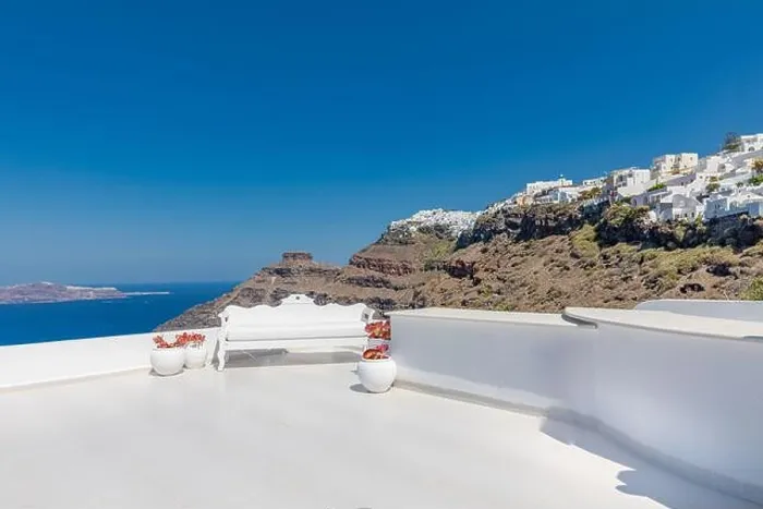 Framed Print : Beautiful Santorini terrace landscape, white architecture with sunny caldera view. Famous tourist hotel resort, travel vacation destination Framed Print : Beautiful Santorini terrace landscape, white architecture with sunny caldera view. Famous tourist hotel resort, travel vacation destination