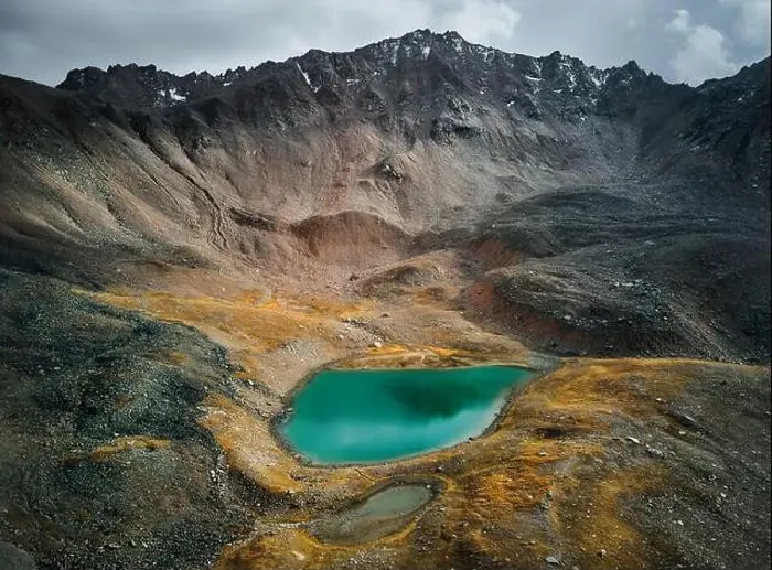 Framed Print : Beautiful scenery of the glacier mountain lakes with snow cap summit near Almaty city Framed Print : Beautiful scenery of the glacier mountain lakes with snow cap summit near Almaty city