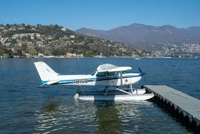 Framed Print : Beautiful seaplane in Como - Como lake in Italy Framed Print : Beautiful seaplane in Como - Como lake in Italy