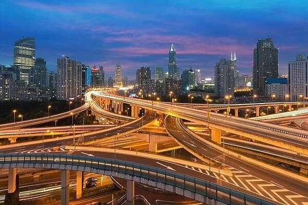 Beautiful Shanghai city with interchange overpass at nightfall in Shanghai, China
