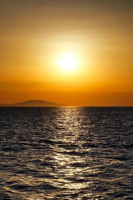 Framed Print : Beautiful shiny warm color sunset above wavy sea surface aerial view Framed Print : Beautiful shiny warm color sunset above wavy sea surface aerial view