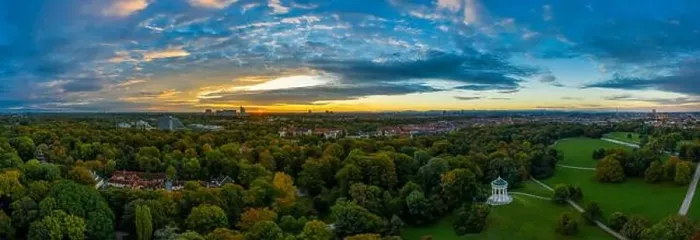 Framed Print : A beautiful start in the day. Sunset over Munichs English Garden as an aerial panorama shot Framed Print : A beautiful start in the day. Sunset over Munichs English Garden as an aerial panorama shot