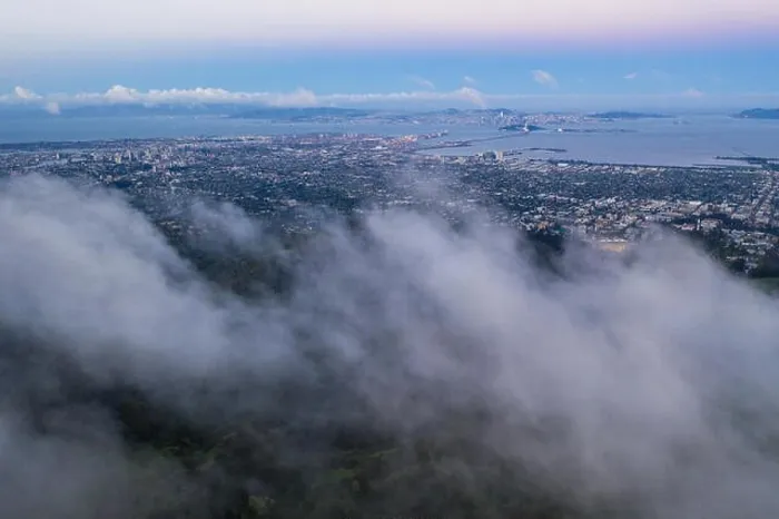 Framed Print : A beautiful sunrise illuminates the hills surrounding San Francisco Bay in Northern California. This area is often covered by a thick marine layer Framed Print : A beautiful sunrise illuminates the hills surrounding San Francisco Bay in Northern California. This area is often covered by a thick marine layer
