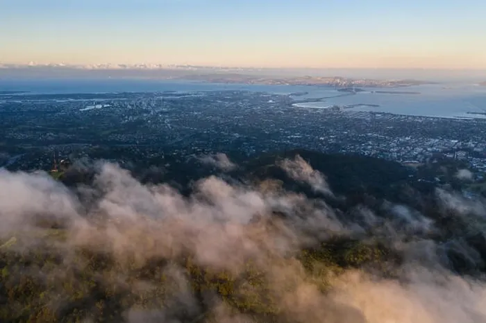 Framed Print : A beautiful sunrise illuminates the hills surrounding San Francisco Bay in Northern California. This area is often covered by a thick marine layer Framed Print : A beautiful sunrise illuminates the hills surrounding San Francisco Bay in Northern California. This area is often covered by a thick marine layer