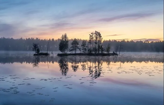 Framed Print : Beautiful sunrise landscape with misty mood and calm lake at foggy summer morning in Finland Framed Print : Beautiful sunrise landscape with misty mood and calm lake at foggy summer morning in Finland