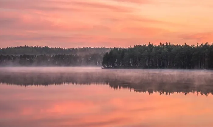 Framed Print : Beautiful sunrise landscape with misty mood and calm lake at foggy summer morning in Finland Framed Print : Beautiful sunrise landscape with misty mood and calm lake at foggy summer morning in Finland