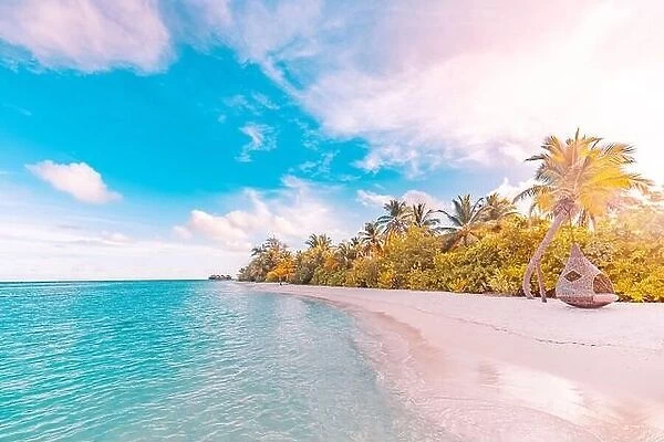 Beautiful sunrise paradise Maldives tropical beach on island. Summer and travel vacation concept. Dream landscape, sunset light, tranquil, relaxing