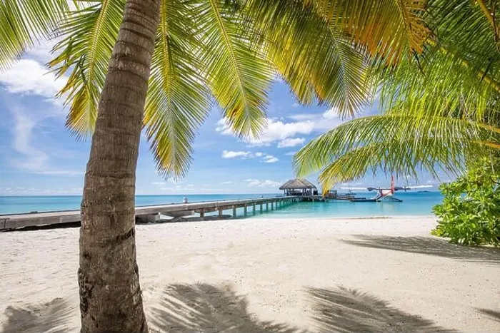 Framed Print : Beautiful tropical Maldives resort hotel and island with beach and sea on sky for holiday vacation background Framed Print : Beautiful tropical Maldives resort hotel and island with beach and sea on sky for holiday vacation background