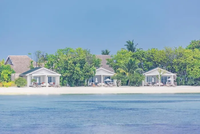 Framed Print : Beautiful tropical Maldives resort hotel and island with beach and sea on sky for holiday vacation background concept - Boost up color Processing