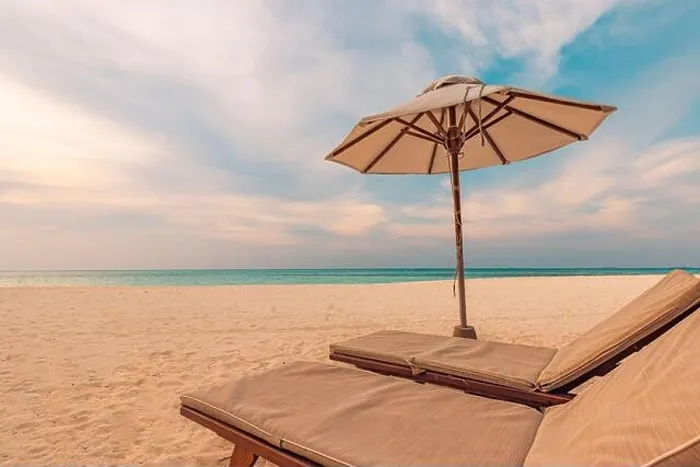 Framed Print : Beautiful tropical sunset scenery, two sun beds, loungers, umbrella. White sand, sea view with horizon, colorful twilight sky, calmness and relaxation Framed Print : Beautiful tropical sunset scenery, two sun beds, loungers, umbrella. White sand, sea view with horizon, colorful twilight sky, calmness and relaxation