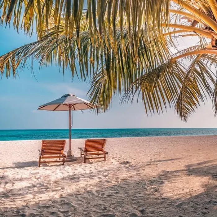 Framed Print : Beautiful tropical sunset scenery, two sun beds loungers umbrella palm tree. White sand, sea view with horizon, colorful twilight sky, beach resort Framed Print : Beautiful tropical sunset scenery, two sun beds loungers umbrella palm tree. White sand, sea view with horizon, colorful twilight sky, beach resort