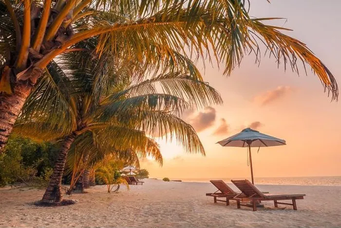 Framed Print : Beautiful tropical sunset scenery, two sun beds loungers umbrella palm tree. White sand, sea view with horizon, colorful twilight sky, beach resort Framed Print : Beautiful tropical sunset scenery, two sun beds loungers umbrella palm tree. White sand, sea view with horizon, colorful twilight sky, beach resort