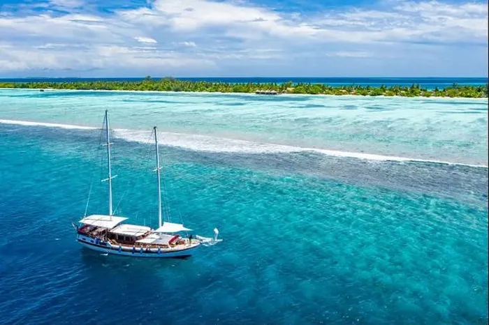 Framed Print : Beautiful turquoise ocean water boat top view aerial photo. Aerial view speed boat in the sea. Exotic sea lagoon, snorkel adventure, tropical ocean Framed Print : Beautiful turquoise ocean water boat top view aerial photo. Aerial view speed boat in the sea. Exotic sea lagoon, snorkel adventure, tropical ocean