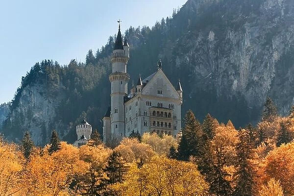 Beautiful view of the Neuschwanstein castle in autumn. Palace situated in Bavaria, Germany. Neuschwanstein is one of the most popular of all palaces a