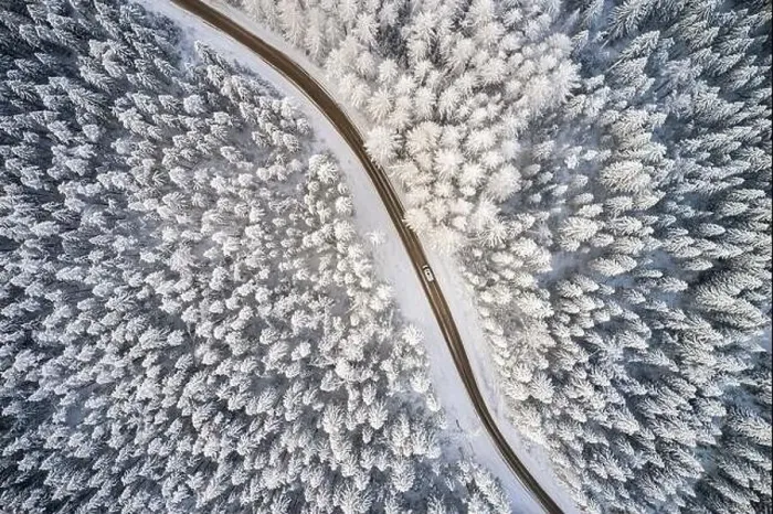 Framed Print : Beautiful winter forest and road. Aerial view Framed Print : Beautiful winter forest and road. Aerial view