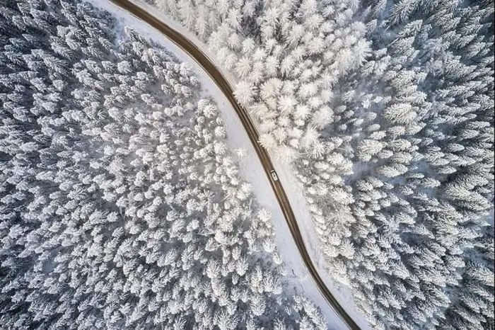 Framed Print : Beautiful winter forest and road. Aerial view Framed Print : Beautiful winter forest and road. Aerial view