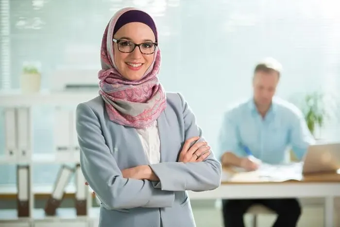 Framed Print : Beautiful young working woman in hijab Framed Print : Beautiful young working woman in hijab