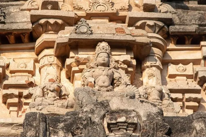 Framed Print : Beautifully carved images on the outer walls of Vijaya Vitthala Temple in Hampi