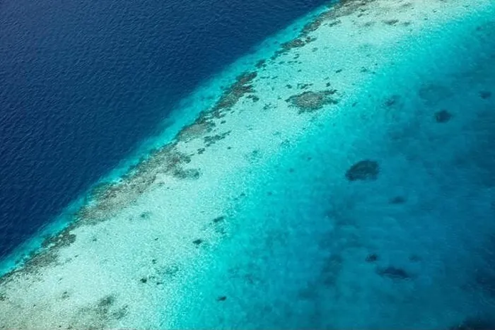 Framed Print : Beauty tropical island. Aerial view on tropical islands, drone, plane view from coral reef atoll in Maldives islands. Exotic travel nature destination Framed Print : Beauty tropical island. Aerial view on tropical islands, drone, plane view from coral reef atoll in Maldives islands. Exotic travel nature destination