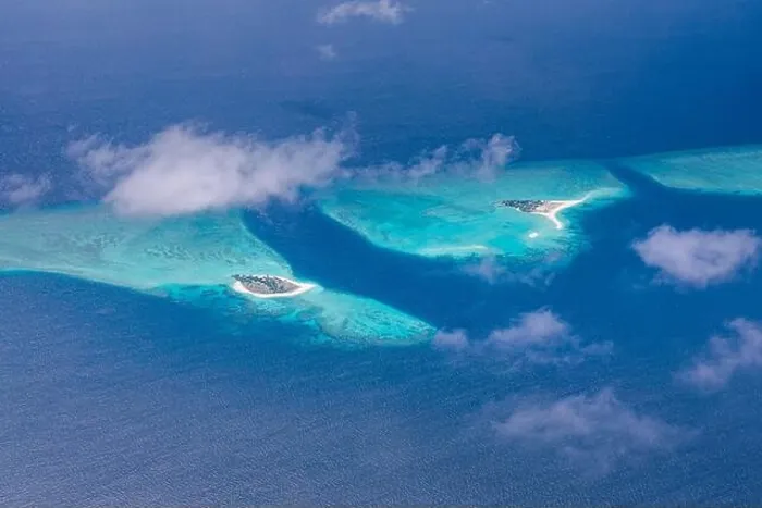 Framed Print : Beauty tropical island. Aerial view on tropical islands, drone, plane view from coral reef atoll in Maldives islands. Exotic travel nature destination Framed Print : Beauty tropical island. Aerial view on tropical islands, drone, plane view from coral reef atoll in Maldives islands. Exotic travel nature destination