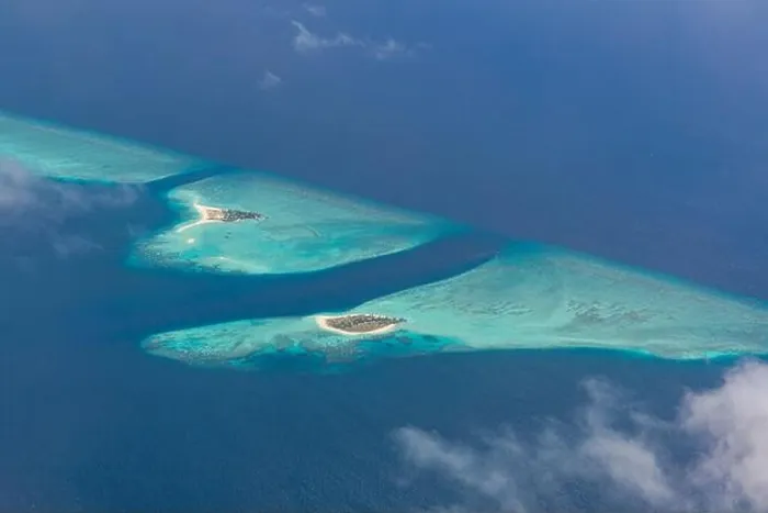 Framed Print : Beauty tropical island. Aerial view on tropical islands, drone, plane view from coral reef atoll in Maldives islands. Exotic travel nature destination Framed Print : Beauty tropical island. Aerial view on tropical islands, drone, plane view from coral reef atoll in Maldives islands. Exotic travel nature destination