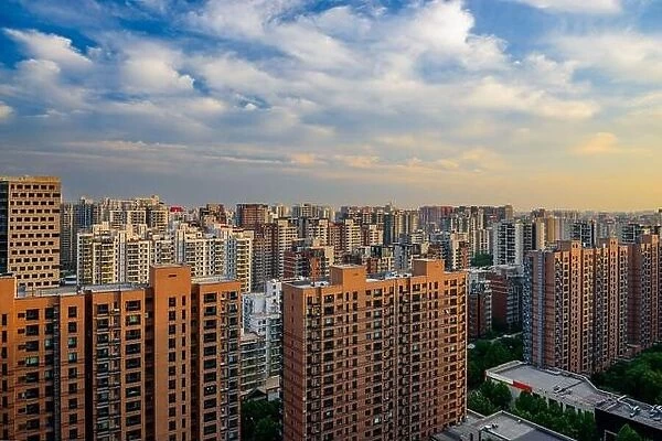 Beijing, China apartment block skyline at dusk