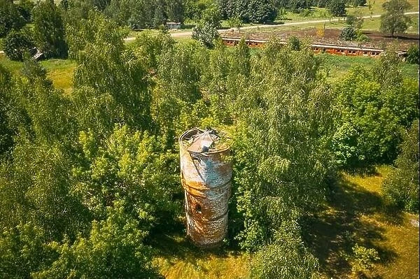Belarus. Aerial View Of Ruined Water Tower In Chernobyl Zone. Chornobyl Catastrophe Disasters. Dilapidated House In Belarusian Village. Whole Villages
