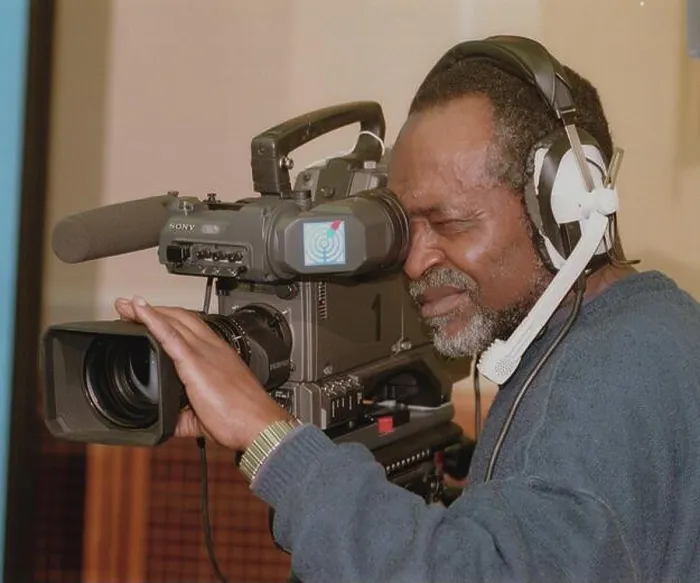 Framed Print : Berlin / Foreigners / Africa / Professions / Press 1998 Cameraman of SFB / RBB from Africa Framed Print : Berlin / Foreigners / Africa / Professions / Press 1998 Cameraman of SFB / RBB from Africa