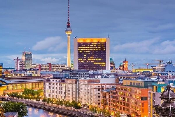 Berlin, Germany city skyline and tower at dusk