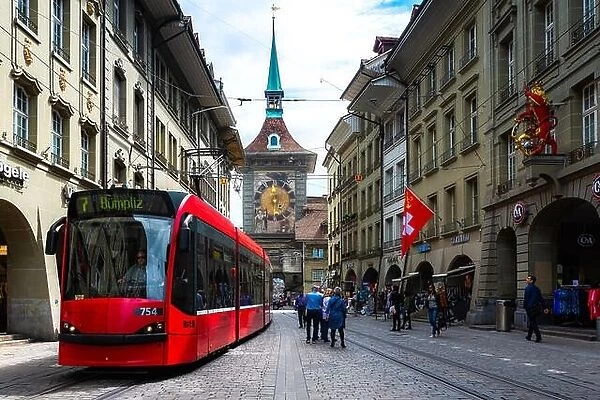 Bern, Switzerland - May 10, 2016 : Shopping street in the old medieval city of Bern, Switzerland. In 1983 the historic old town in the centre of Bern