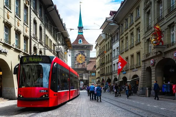 Framed Print : Bern, Switzerland - May 10, 2016 : Shopping street in the old medieval city of Bern, Switzerland. In 1983 the historic old town in the centre of Bern Framed Print : Bern, Switzerland - May 10, 2016 : Shopping street in the old medieval city of Bern, Switzerland. In 1983 the historic old town in the centre of Bern